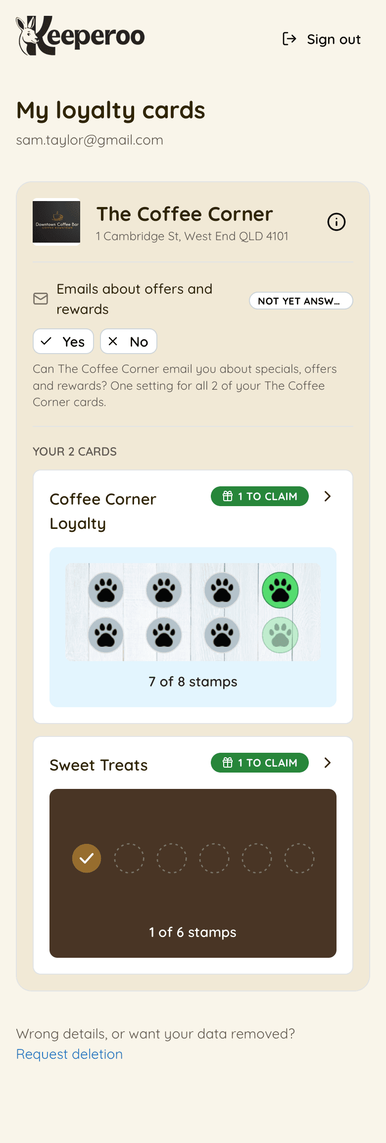 The portal card list: cards grouped by business, each showing its stamps and any reward waiting